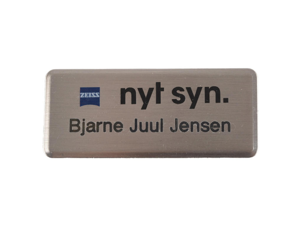 Nyt Syn Navneskilt 26x60mm Sølvmetal